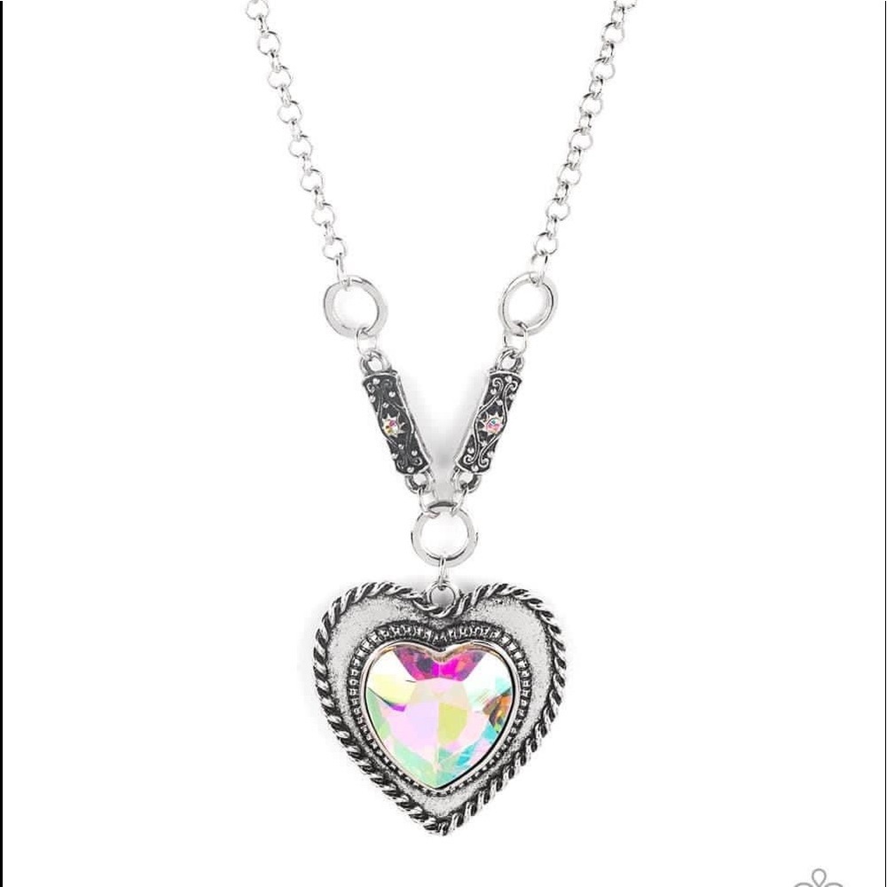 NWT Irredesent Heart Necklace with matching earrings.